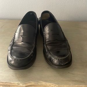 Tod’s men’s black penny loafers